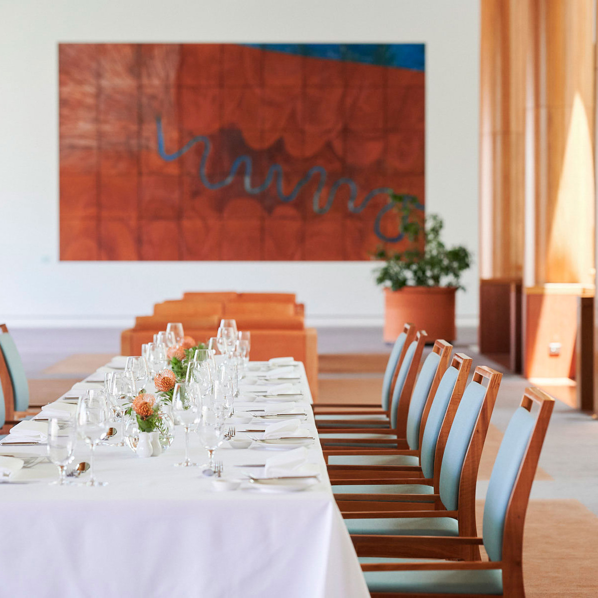 Long set table in Mural Hall